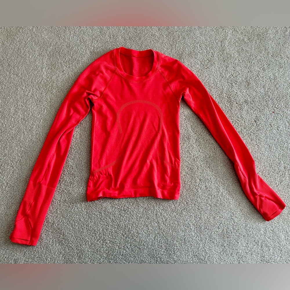 Lululemon Swiflty Tech Long Sleev (race Length) Size 0 is a bright coral color